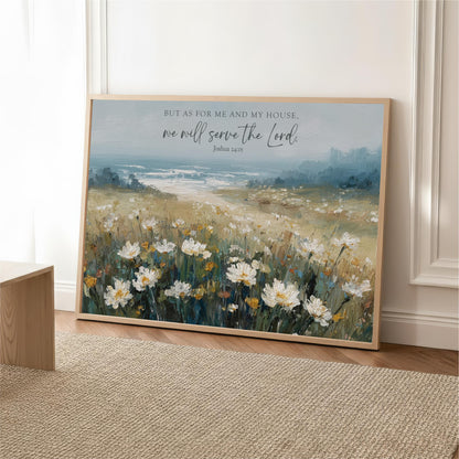 A framed painting depicting a field of white flowers against a blue sky, with a text overlay that reads "But as for me and my house, we will serve the Lord."