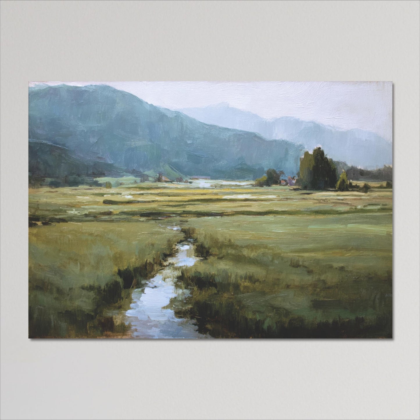 a serene landscape with a winding stream flowing through a grassy field, surrounded by mountains in the distance.
