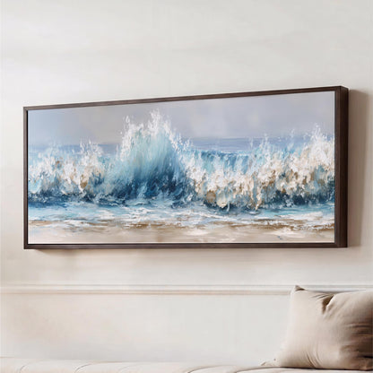 a large framed painting of a crashing wave, hanging on a wall above a couch.