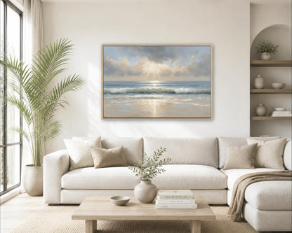 a serene living room with a large window overlooking a beach, a white sofa, a wooden coffee table, and a framed painting of a beach scene hanging on the wall.