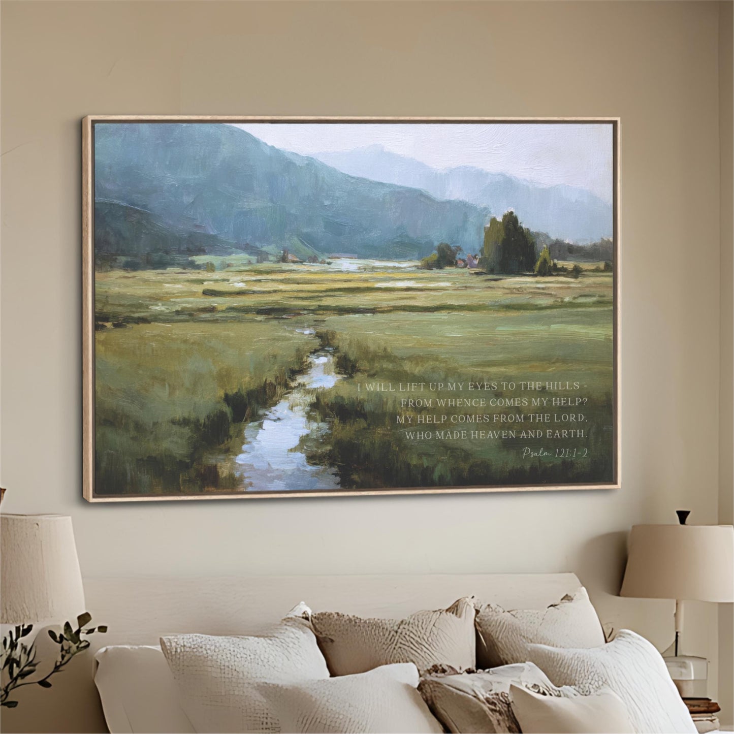 A large landscape painting depicting a serene countryside scene with a winding stream, mountains in the distance, and a text overlay that reads "Will I lift eyes to the hills? Will I help when eyes come to my hills? My help comes from the Lord. Who made heaven and earth?"