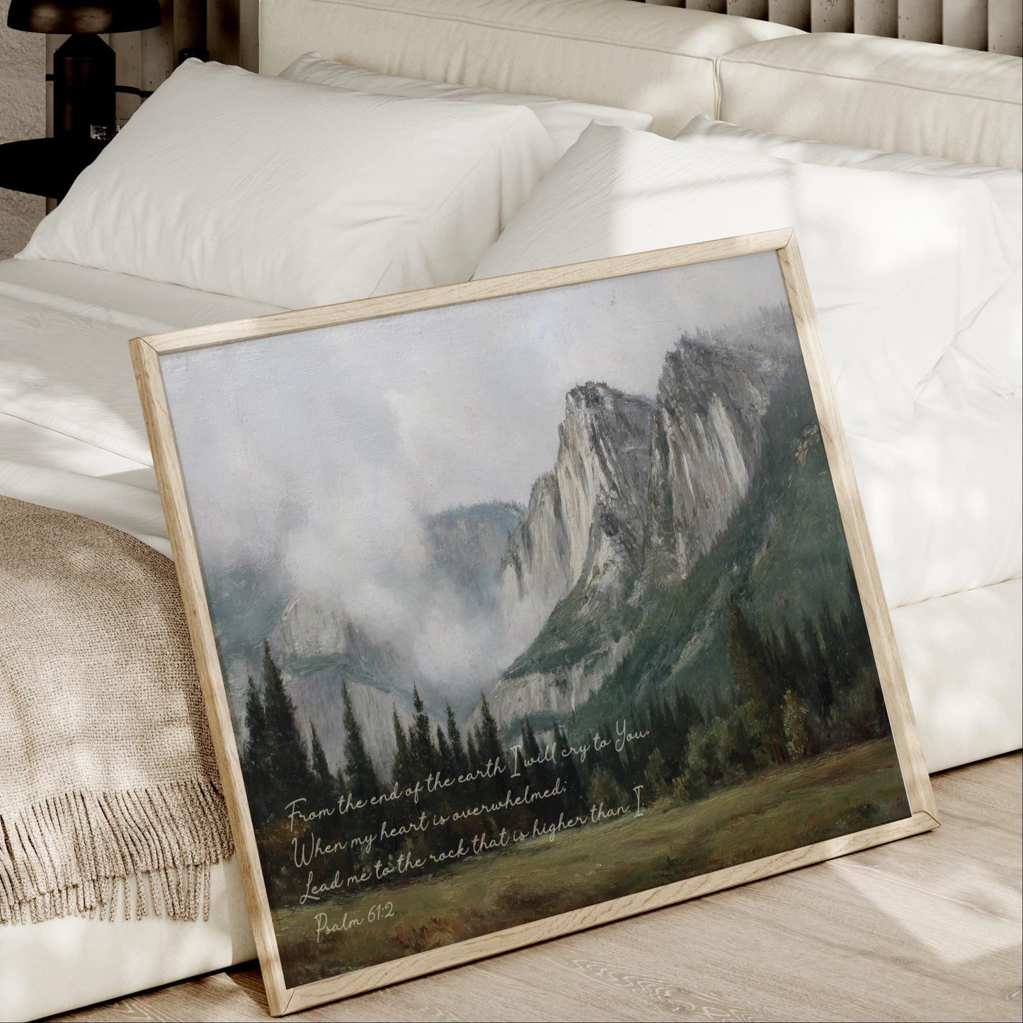 A framed painting of a mountainous landscape with a text overlay that reads "From the end of the earth I will die to you. When my heart is overwhelmed, lead me to the rest that is higher than I. Psalm 112".