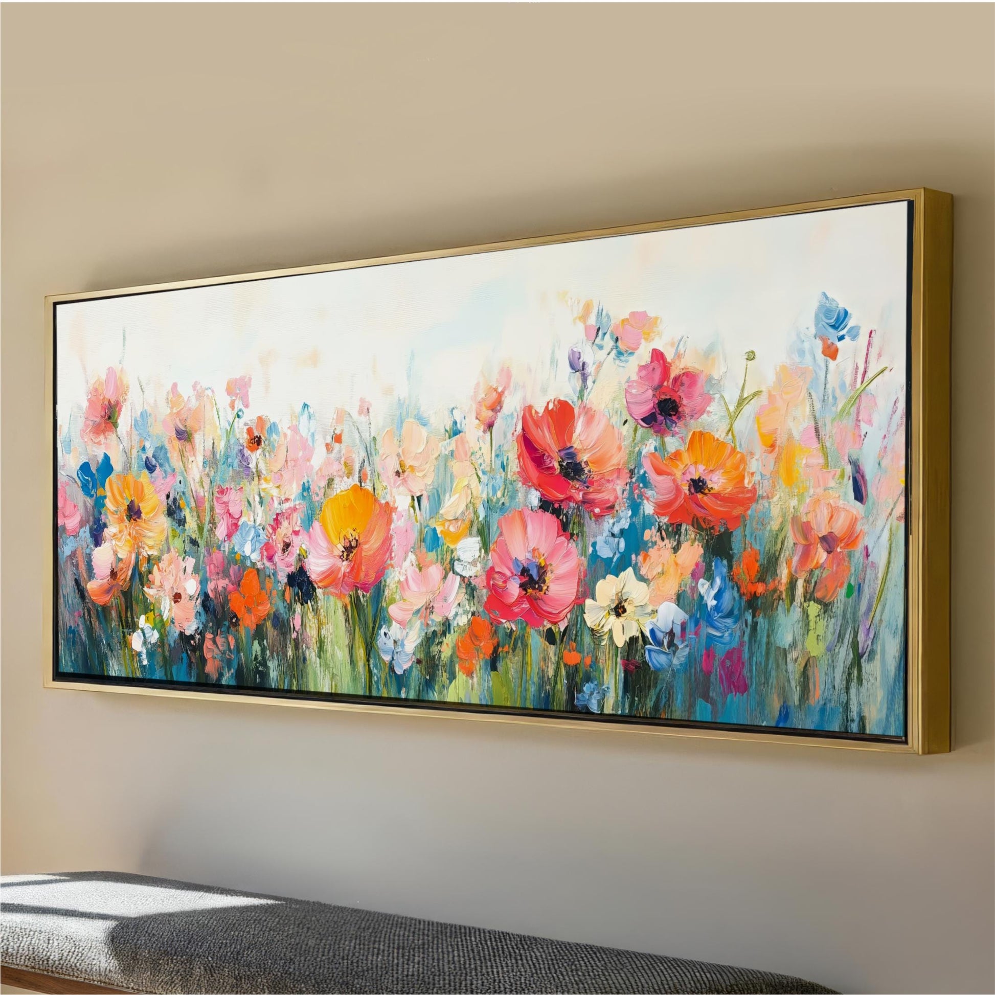 a large, colorful painting of a field of flowers hanging on a wall.