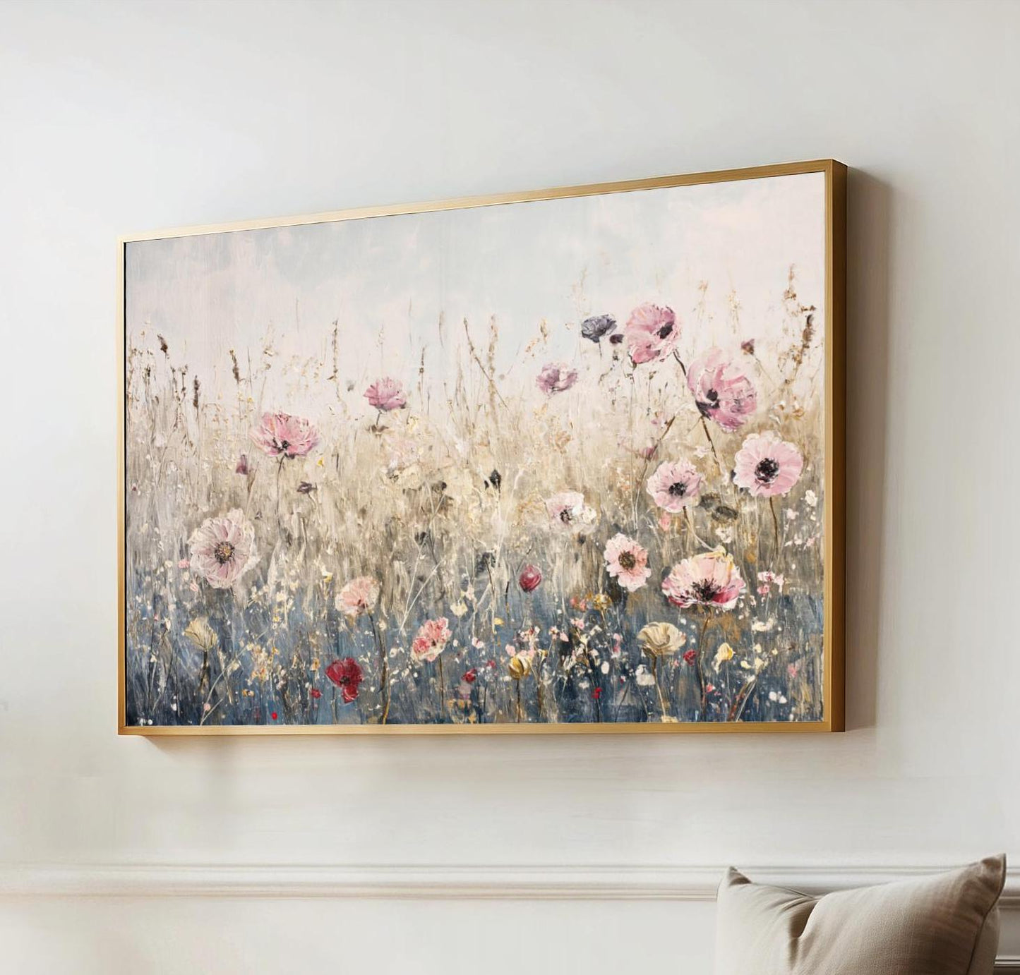 a painting hanging on a wall above a couch