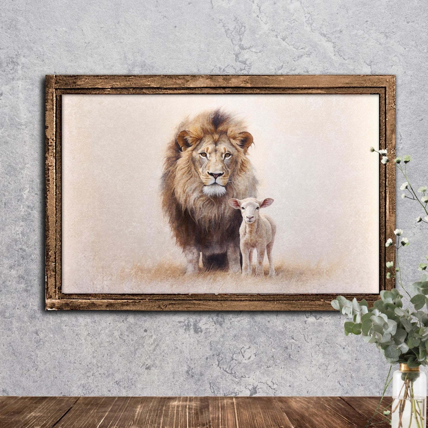 A framed painting depicting a lion and a lamb standing together in a natural setting.