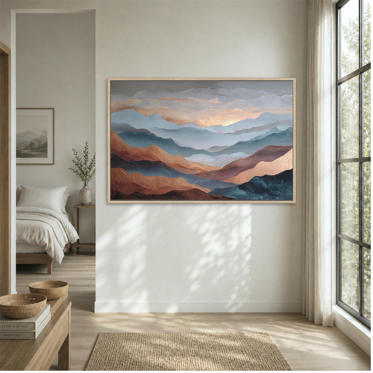 a large, framed painting of mountains hanging on a wall in a bedroom.