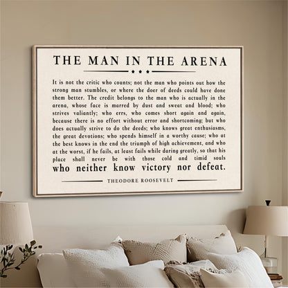 a framed quote by Theodore Roosevelt, which is a famous speech by the former US President. The quote discusses the importance of perseverance and determination in the face of challenges and setbacks.
