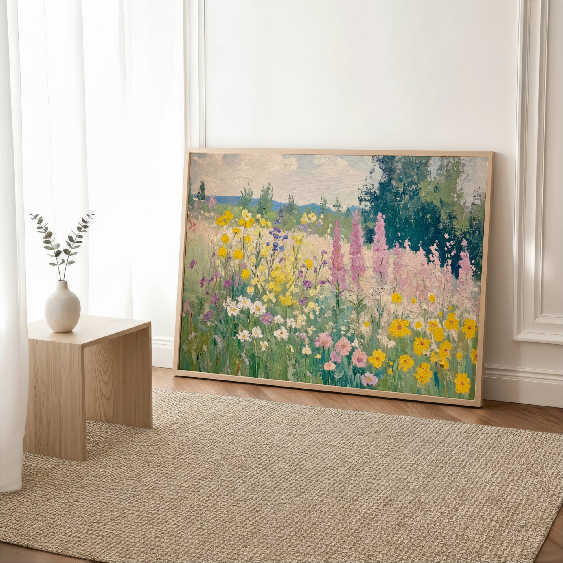 a large painting of a colorful garden with various flowers and plants, displayed on a wall in a room with a wooden table and a vase of flowers.
