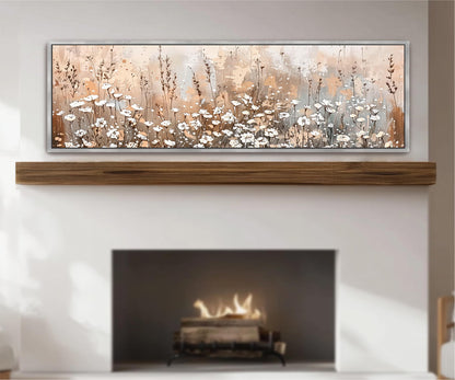 a fireplace with a wooden mantel and a painting of flowers above it.