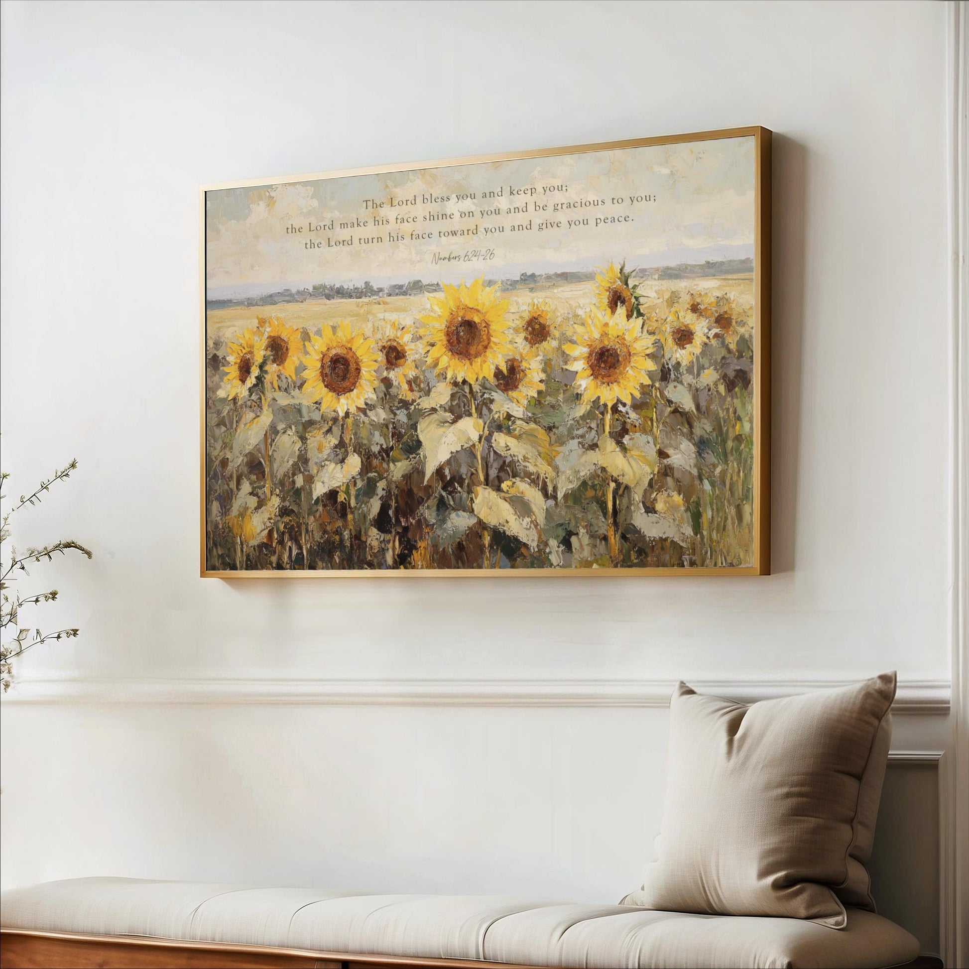 a large painting of a field of sunflowers hanging on a wall, with a quote from the Bible verse "The Lord Bless You and Keep You" above it.