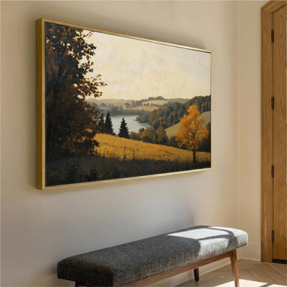 a large landscape painting hanging on a wall, depicting a serene countryside scene with trees, grass, and a body of water.