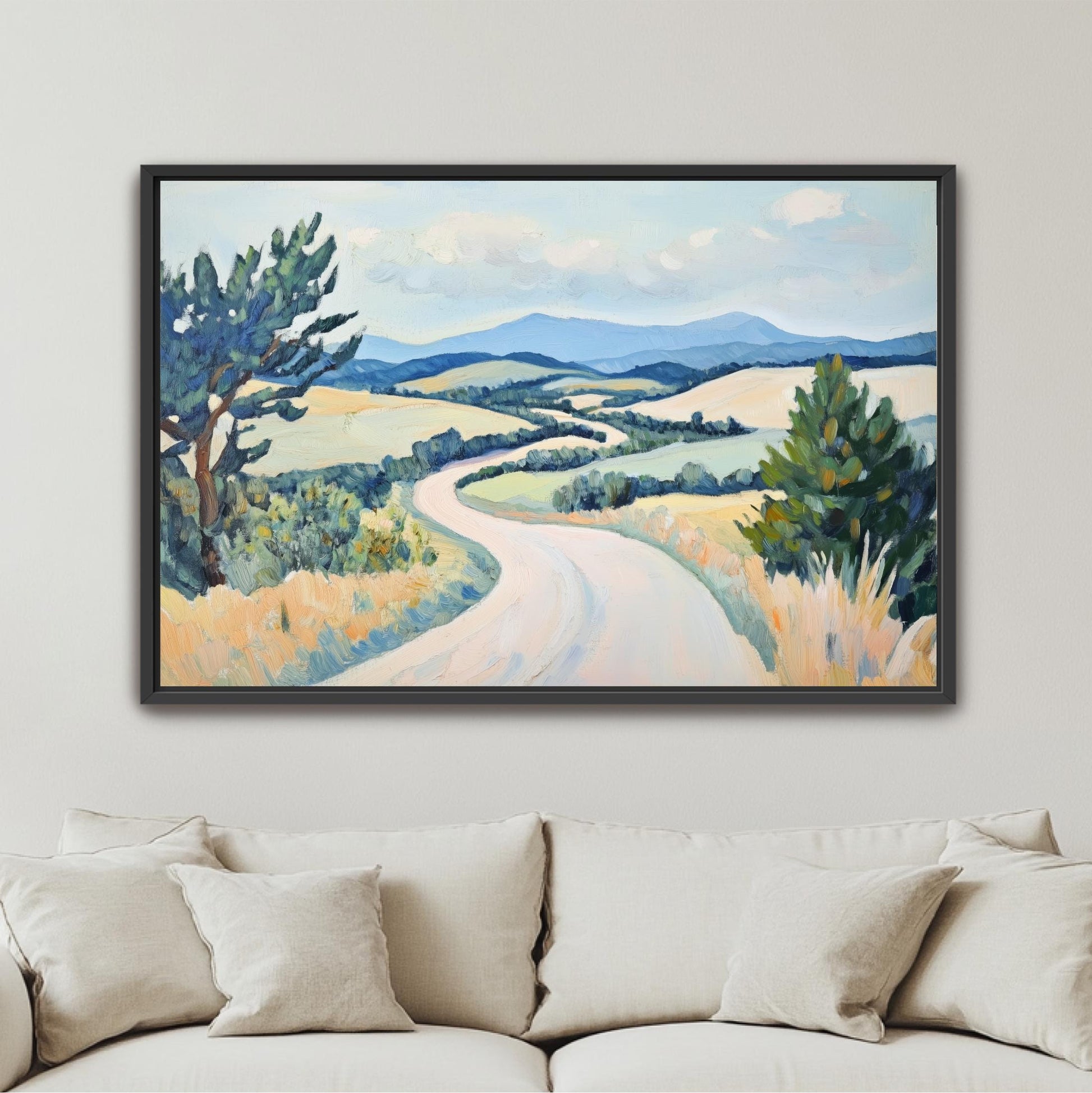 The image is a framed painting depicting a winding road through a rural landscape with rolling hills, trees, and a blue sky with clouds.