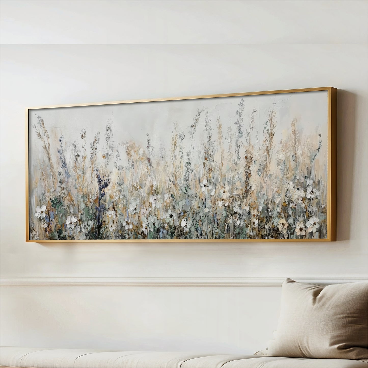 a large, framed painting of a field of flowers hanging on a wall.