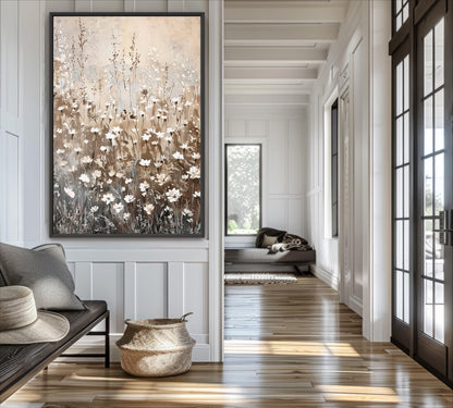 a modern and minimalist living room with a large painting of flowers on the wall, a sofa, a basket, and a large window.