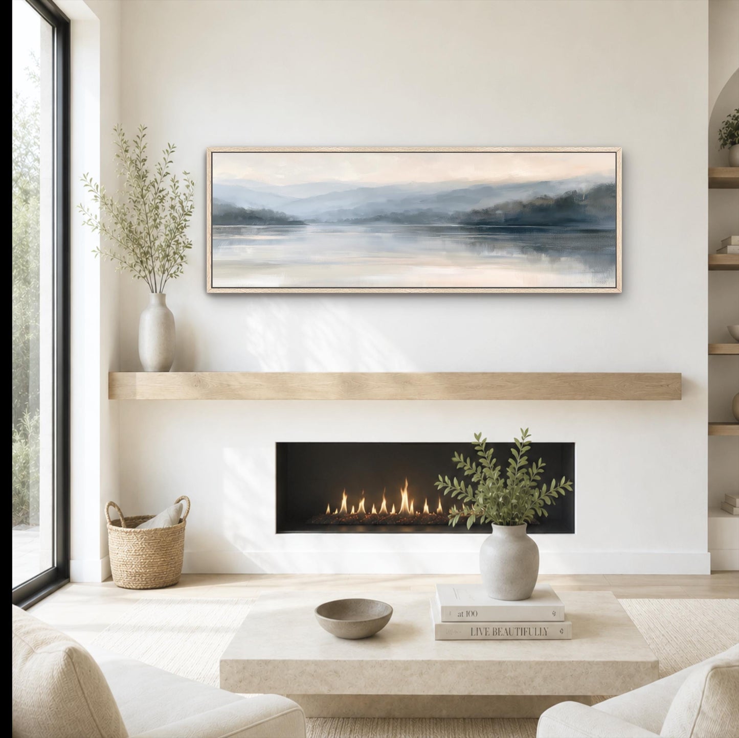 a cozy living room with a fireplace, a coffee table, and a painting of a serene landscape above it. The room has a minimalist and modern design, with a large window providing natural light and a view of the outdoors. The fireplace adds warmth and ambiance to the space, while the painting above it serves as a focal point and adds an artistic touch to the room.