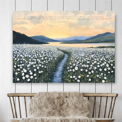a serene landscape with a winding path leading through a field of white flowers, surrounded by mountains and a lake.