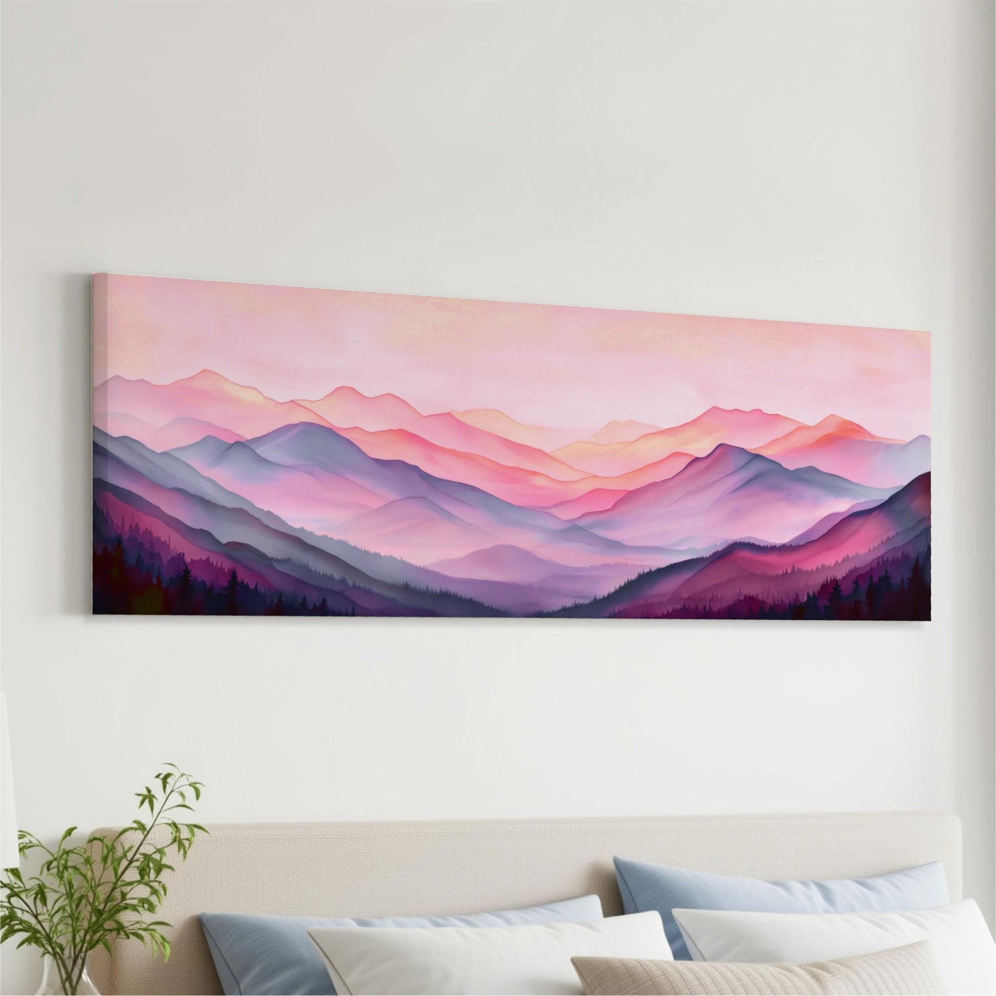 a large, colorful painting of mountains with a pink and purple gradient background, hanging on a wall above a bed with white pillows.