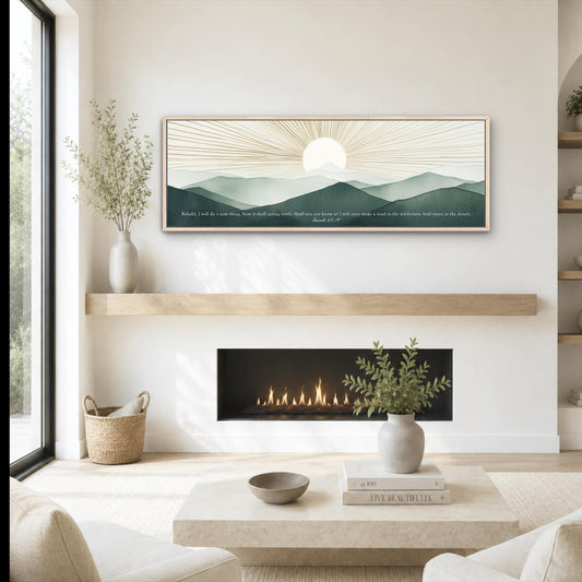 a cozy living room with a fireplace, a coffee table, and a framed landscape painting hanging on the wall above the fireplace.