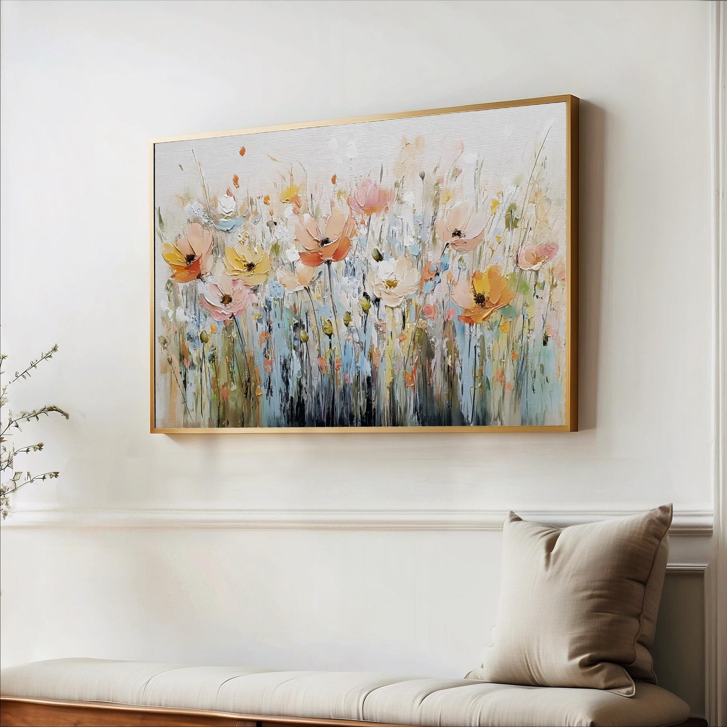 a large, colorful painting of flowers hanging on a wall above a bench.