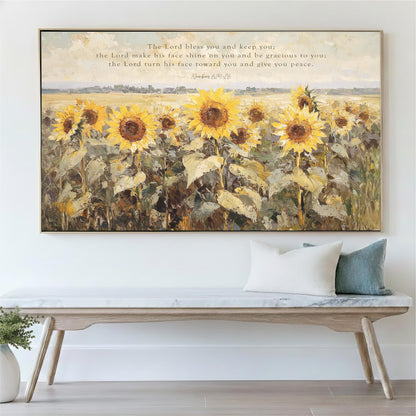 a large painting of a field of sunflowers hanging on a wall above a wooden bench.