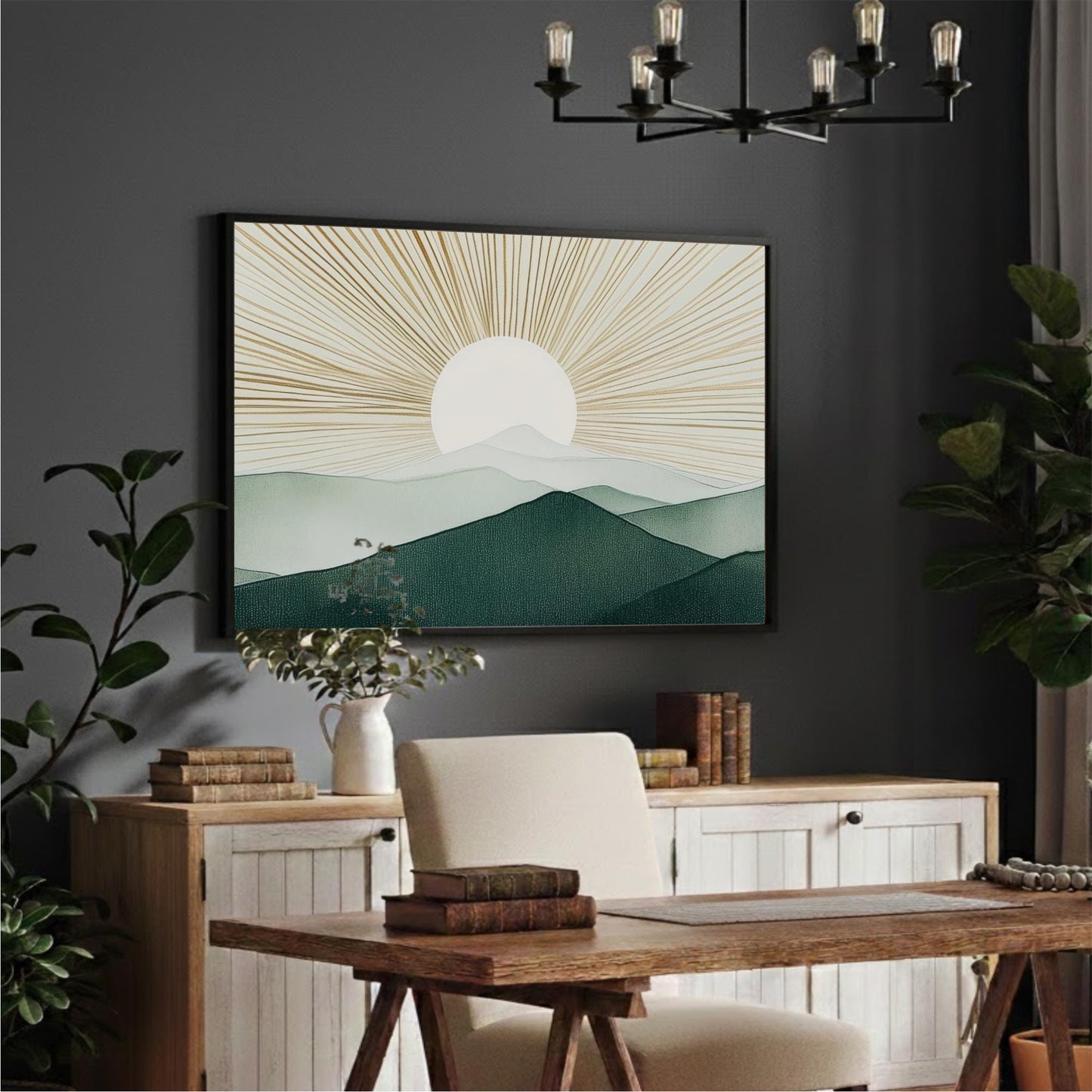 a serene and modern office space with a large framed landscape painting depicting a sun-filled mountain scene hanging on the wall above a wooden desk. The desk is surrounded by a white chair and has a stack of books and a plant on it. The room is decorated with several potted plants and a chandelier, creating a calm and inviting atmosphere.