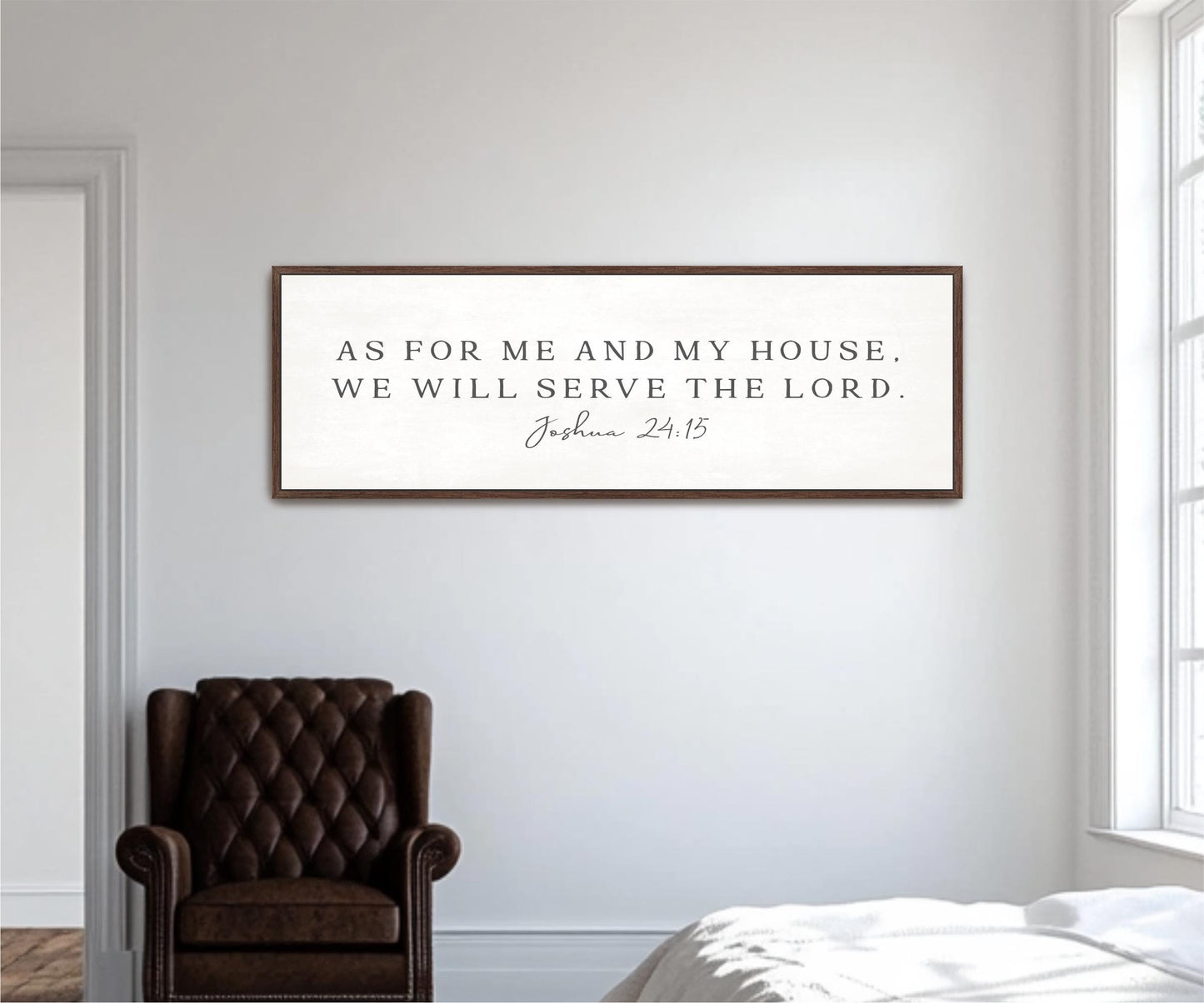 a framed inspirational quote on a white wall, which reads "As for me and my house, we will serve the Lord."