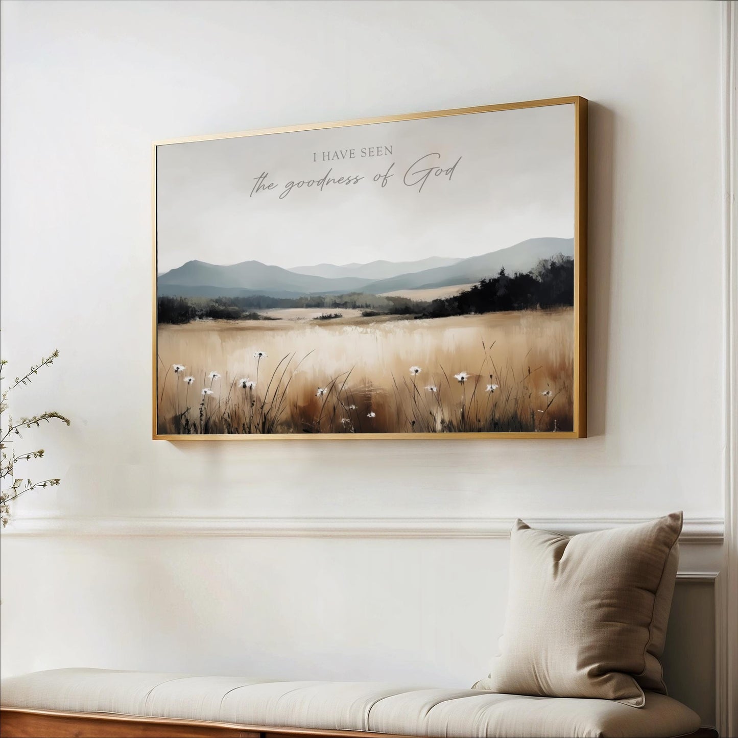 a large framed painting of a field with flowers hanging on a wall.