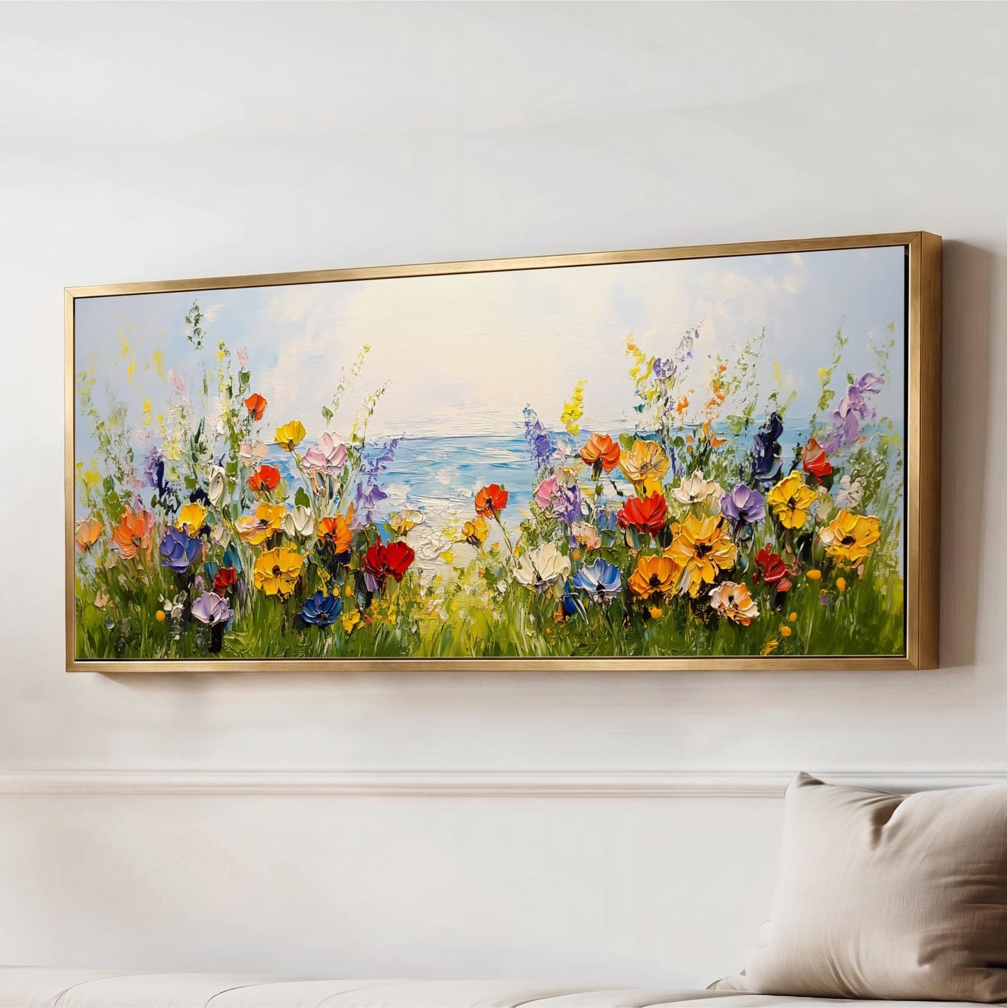 a large, colorful painting of a field of flowers hanging on a wall.