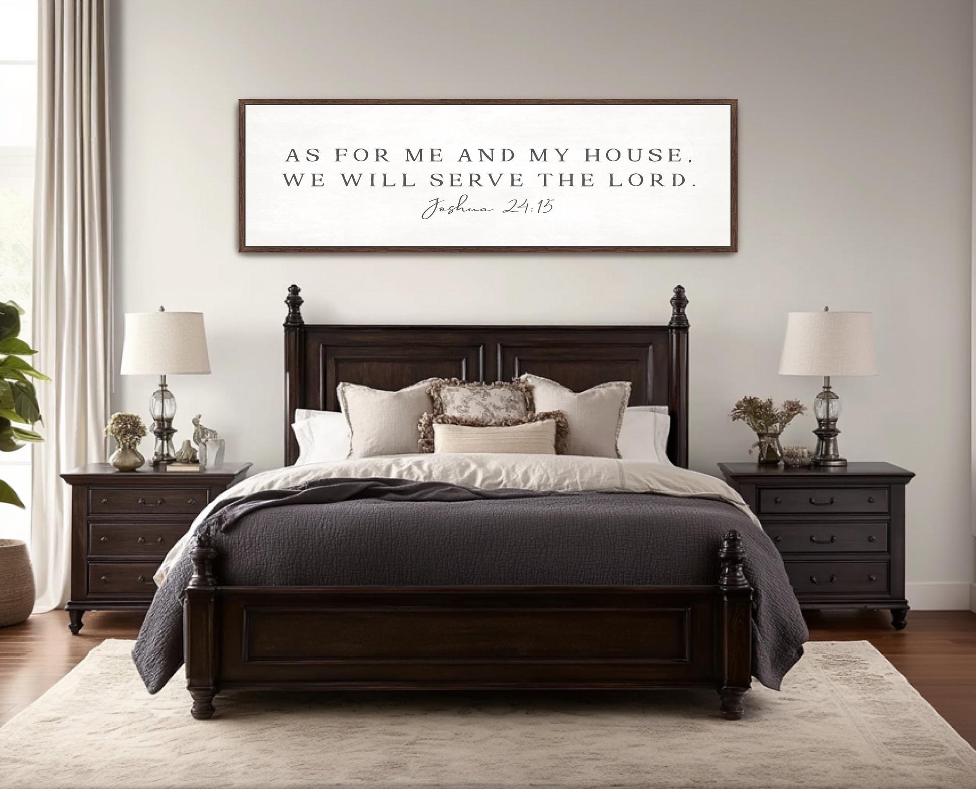 a bedroom with a large wooden bed, a nightstand on each side, and a framed inspirational quote above the bed.