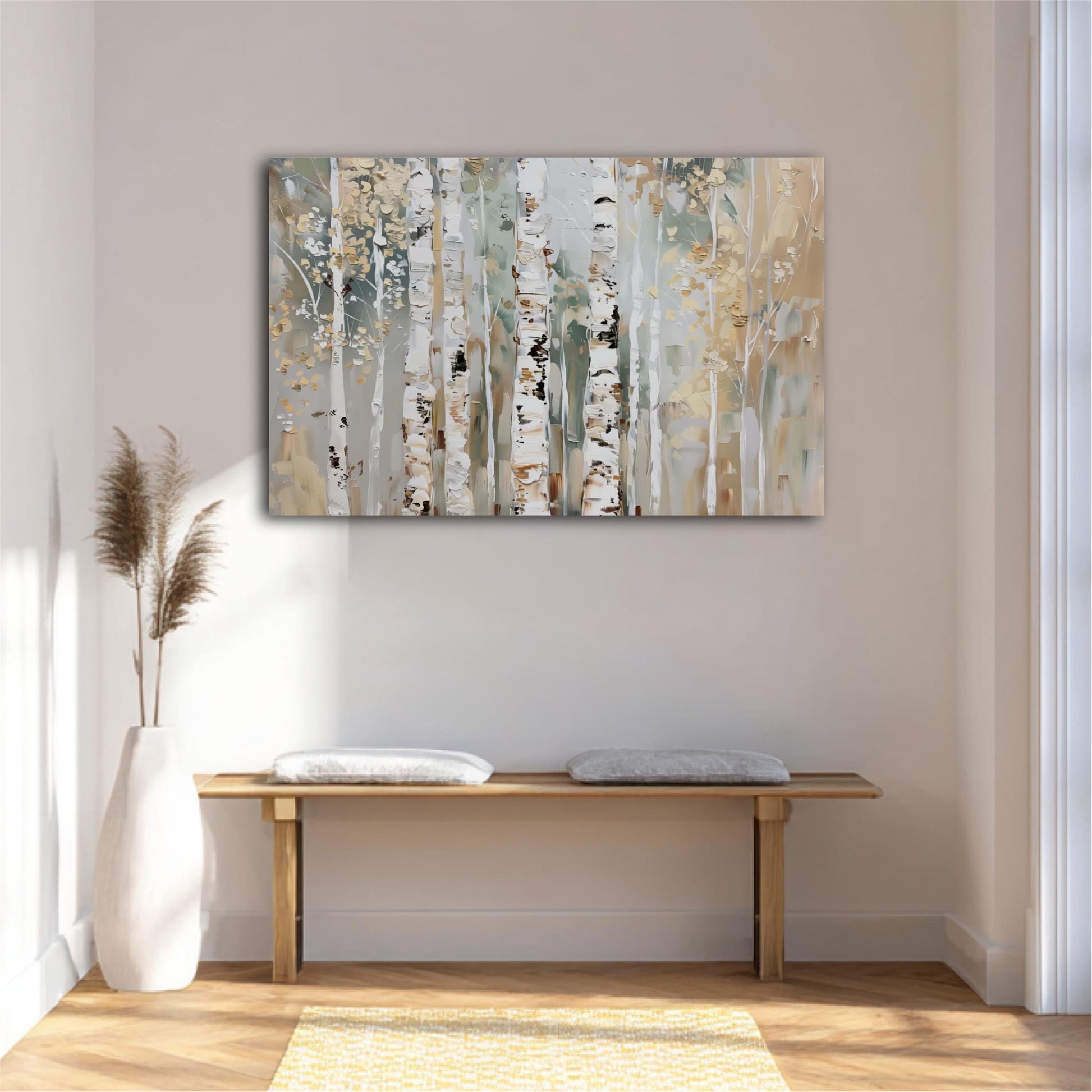 a large painting of birch trees hanging on a wall above a wooden bench with two cushions.