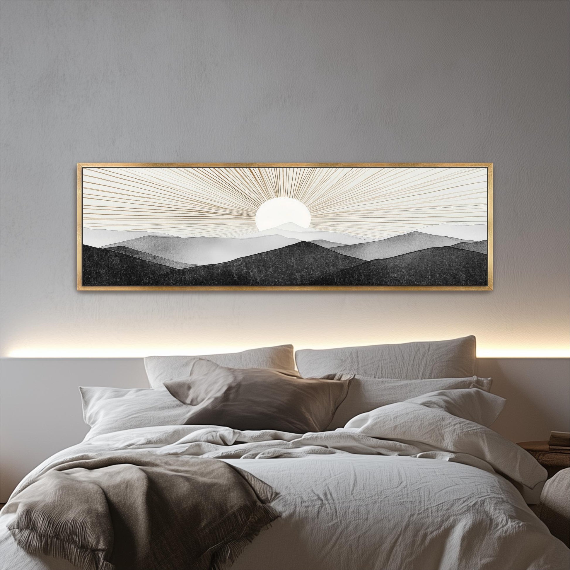 a large, framed painting of a sunrise over mountains hanging above a bed with white bedding.
