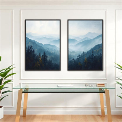 two framed landscape paintings hanging on a white wall above a glass desk with a wooden frame.