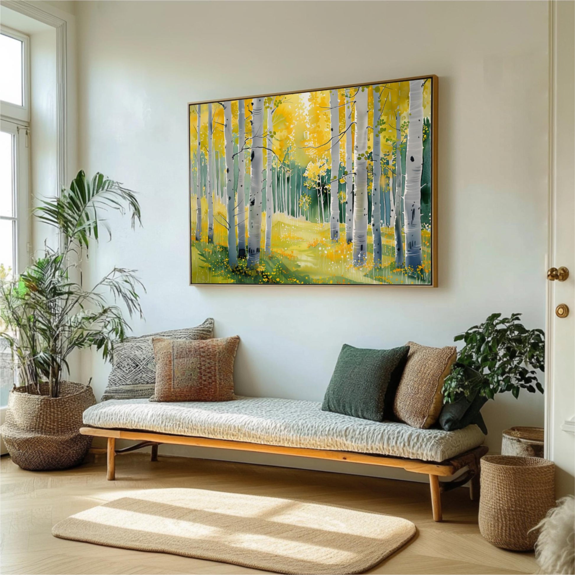 a living room with a large painting of a forest scene hanging on the wall. The painting has a vibrant yellow and green color scheme, depicting a path through the trees. The room is decorated with various plants, including a palm tree and a fern, adding a touch of nature to the space. A bench with pillows is placed in front of the painting, and a rug covers the floor, providing a cozy and inviting atmosphere.