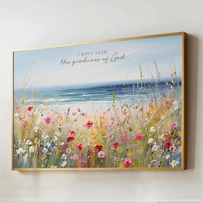 The image is a framed painting depicting a vibrant field of colorful flowers, with a serene body of water in the background.