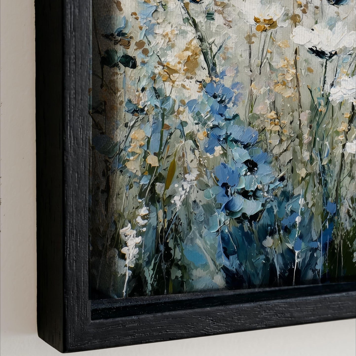 The image is a framed painting depicting a vibrant and colorful floral scene with various shades of blue, green, and yellow flowers.