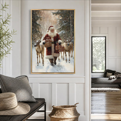 A framed painting of Santa Claus holding reindeer in a snowy forest setting hangs on a wall in a cozy living room.