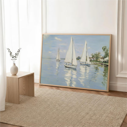 a large painting of three sailboats on a body of water, with a wooden table and a vase of greenery nearby.