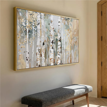 a large painting of birch trees hanging on a wall, with a wooden bench placed in front of it.