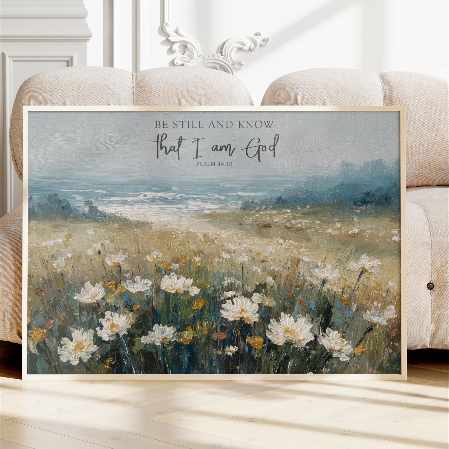 The image is a framed painting depicting a field of white flowers against a blue sky.