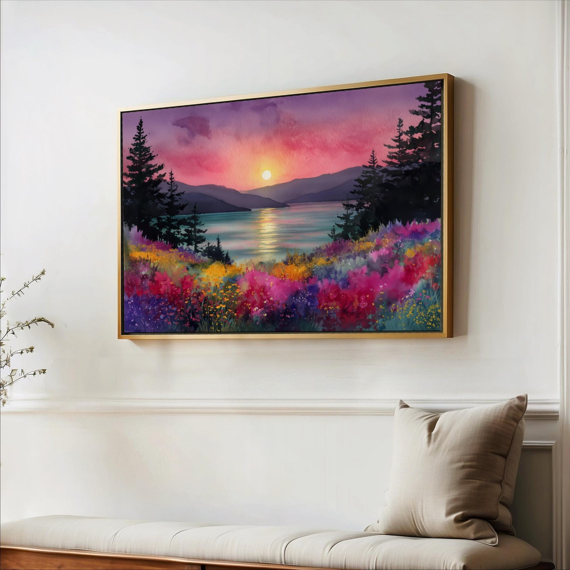 a large, colorful painting of a sunset over a mountain landscape, hanging on a wall above a bench.