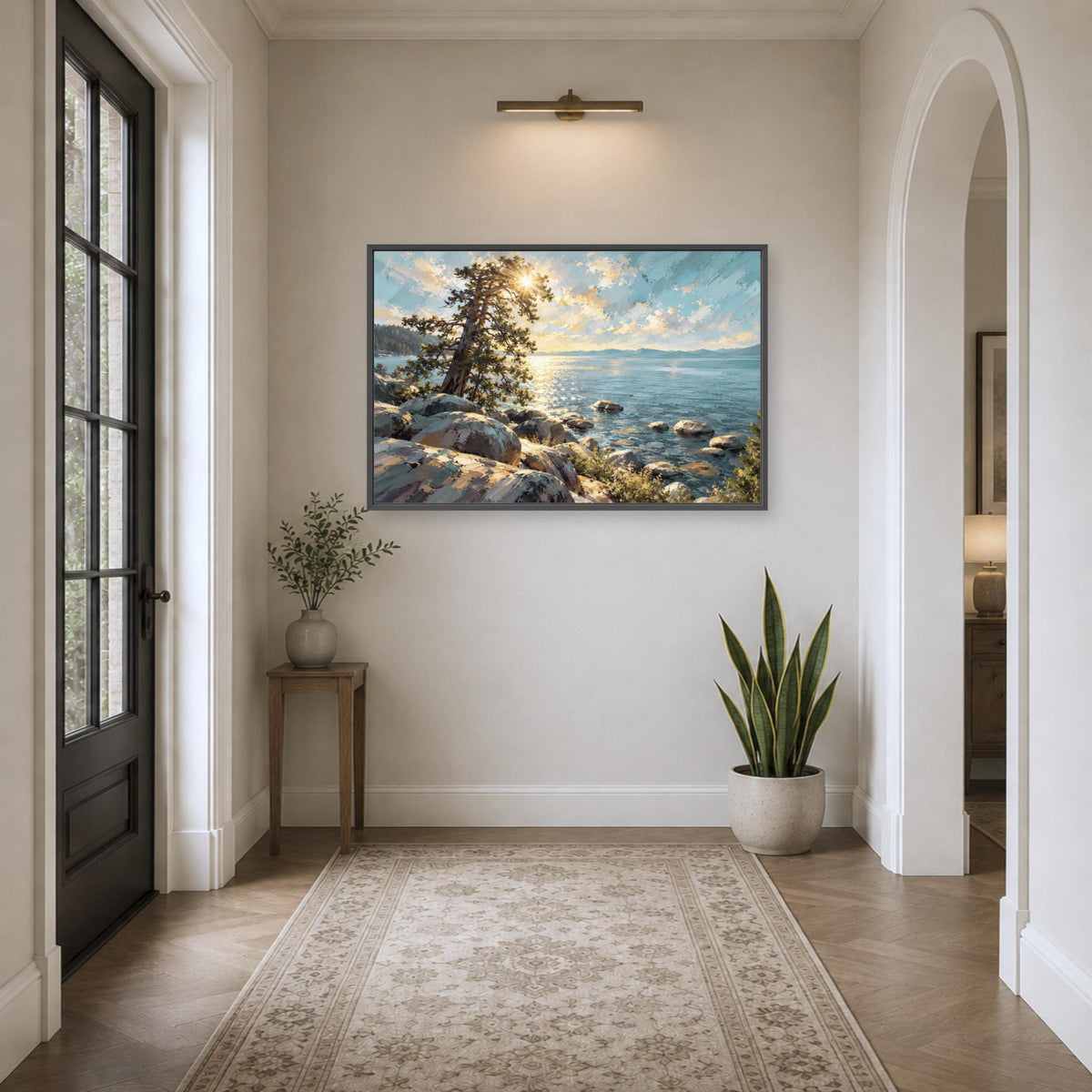 a serene hallway with a large painting of a rocky coastline and a tree hanging on the wall. The painting is framed in black and is the focal point of the room. The hallway is decorated with a rug, a small table with a plant, and a potted plant, creating a cozy and inviting atmosphere.