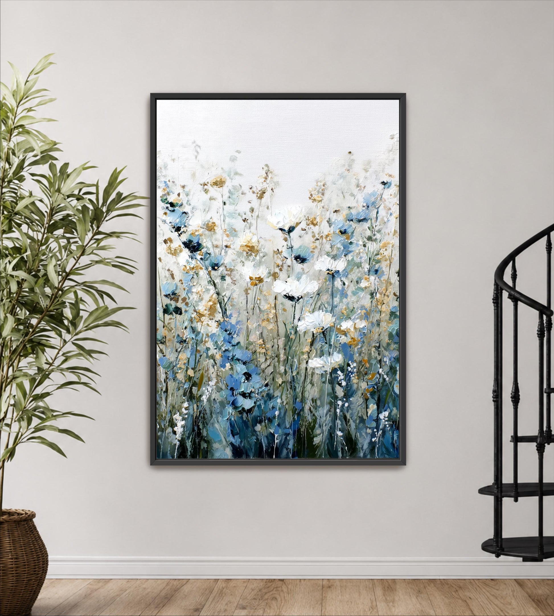 a large framed painting of a field of flowers hanging on a wall.