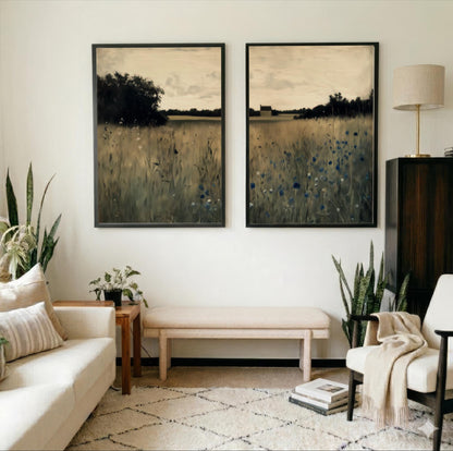 a cozy living room with two large paintings of a field of flowers hanging on the wall. The room is furnished with a couch, a chair, and a coffee table, creating a comfortable and inviting atmosphere.