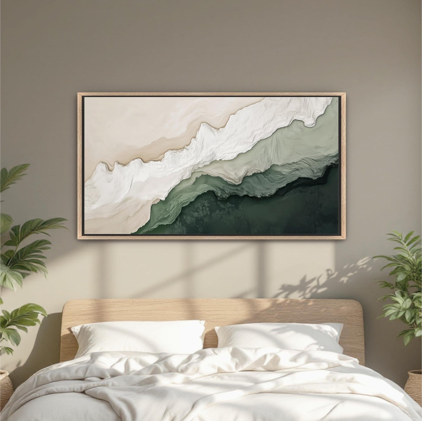 a large abstract painting hanging on a wall above a bed with white bedding.