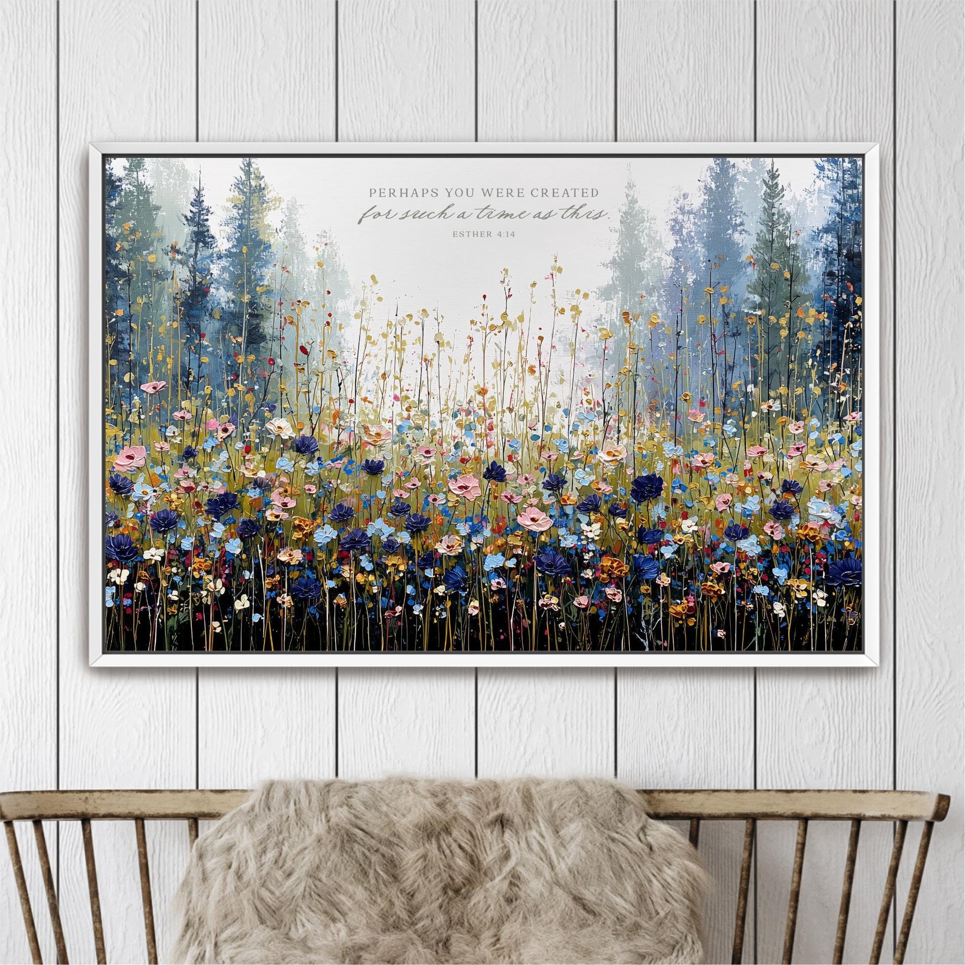 The image is a framed painting depicting a vibrant field of wildflowers, with a forest in the background.
