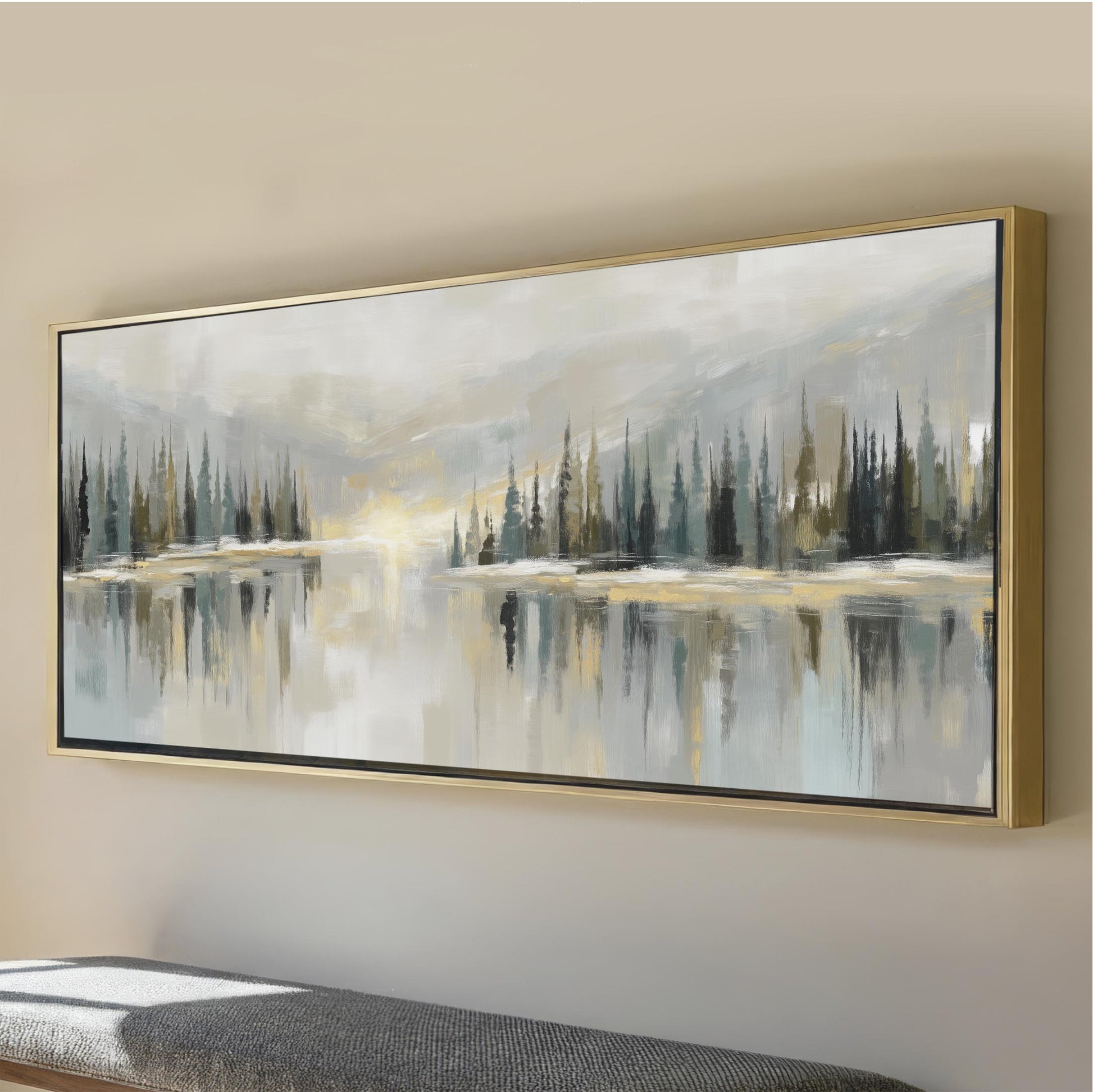 a large, framed painting depicting a serene landscape with a lake and trees reflected in the water.