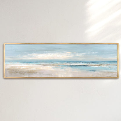 A framed painting depicting a serene beach scene with a calm ocean and a light blue sky.