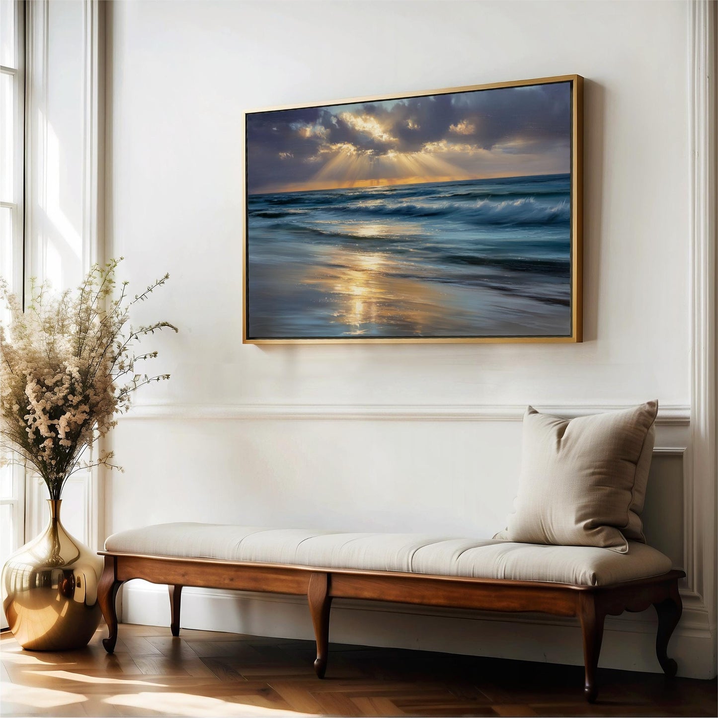 a serene indoor setting with a large painting of a beach scene hanging on the wall above a wooden bench. The painting depicts a tranquil beach with waves gently lapping at the shore, and the sky is filled with clouds, creating a peaceful atmosphere. The bench is positioned next to a window, allowing natural light to illuminate the space and enhance the overall ambiance.