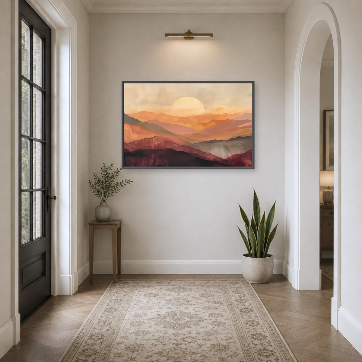 a hallway with a large painting of a mountain landscape hanging on the wall. The painting features a warm, orange and red color palette, creating a serene and inviting atmosphere. The hallway is decorated with a rug, a small table with a plant, and a potted plant, adding a touch of greenery and natural elements to the space.