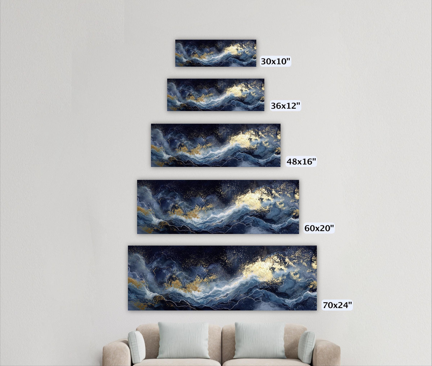 A wall with five framed artworks of varying sizes, each depicting a different ocean wave pattern in shades of blue and gold.